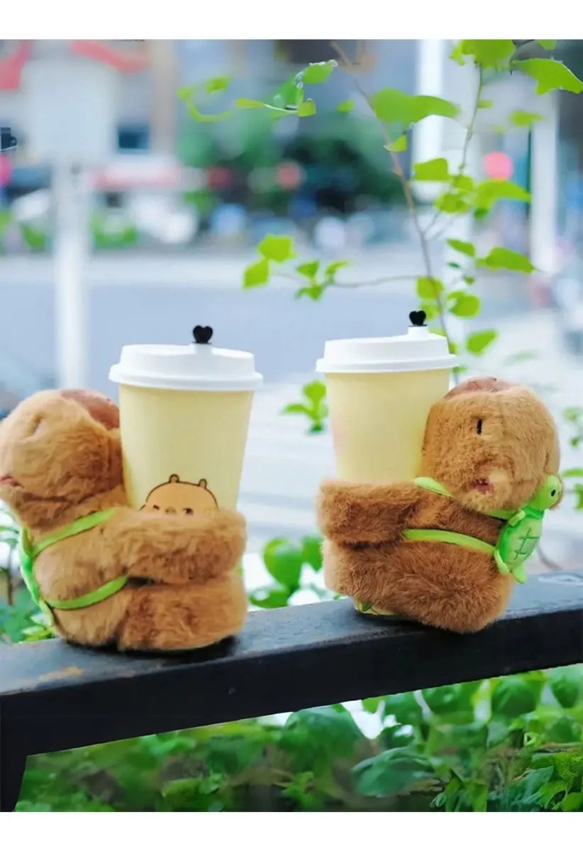 ⭐Peluche Brazalete de Abrazo Capibara con Mochila de tortuguita⭐